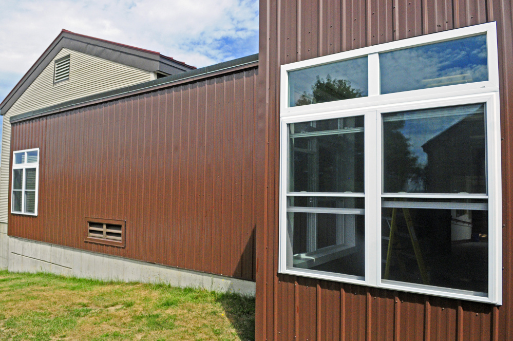 This newly replaced steel siding and these windows are some of the repairs done over the summer at Whitefield Elementary School.