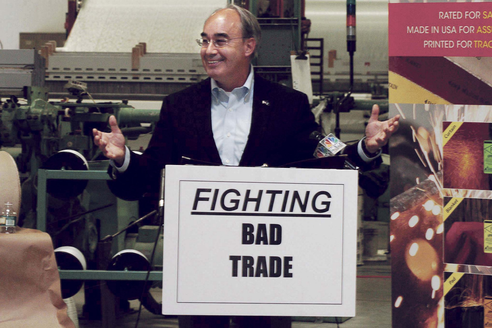 U.S. Rep. Bruce Poliquin, R-2nd District, speaks about fair trade Tuesday at Auburn Manufacturing in Auburn. Duties recently approved on Chinese textiles will create a level playing field for U.S. manufacturers, he said.