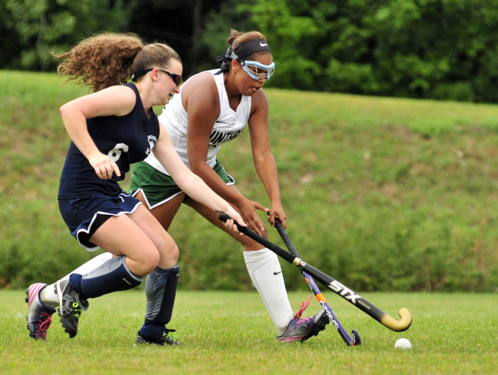 Telstar's Wynter Morin, left, tries to stop Winthrop sophomore Breonna Feeney during a season-opening game Wednesday at Winthrop High School. The Ramblers won, 9-0.