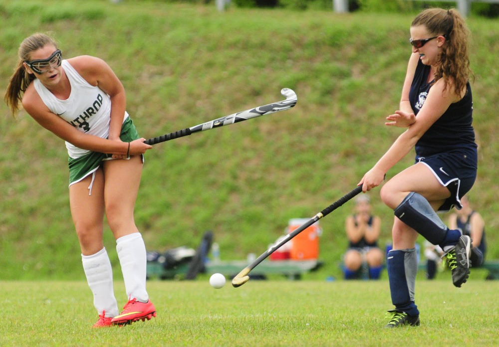 Winthrop sophomore Elle Blanchard, left, tries to get the ball past Telstar defender Wynter Morin during a season-opening game Wednesday at Winthrop High School. The Ramblers won, 9-0.