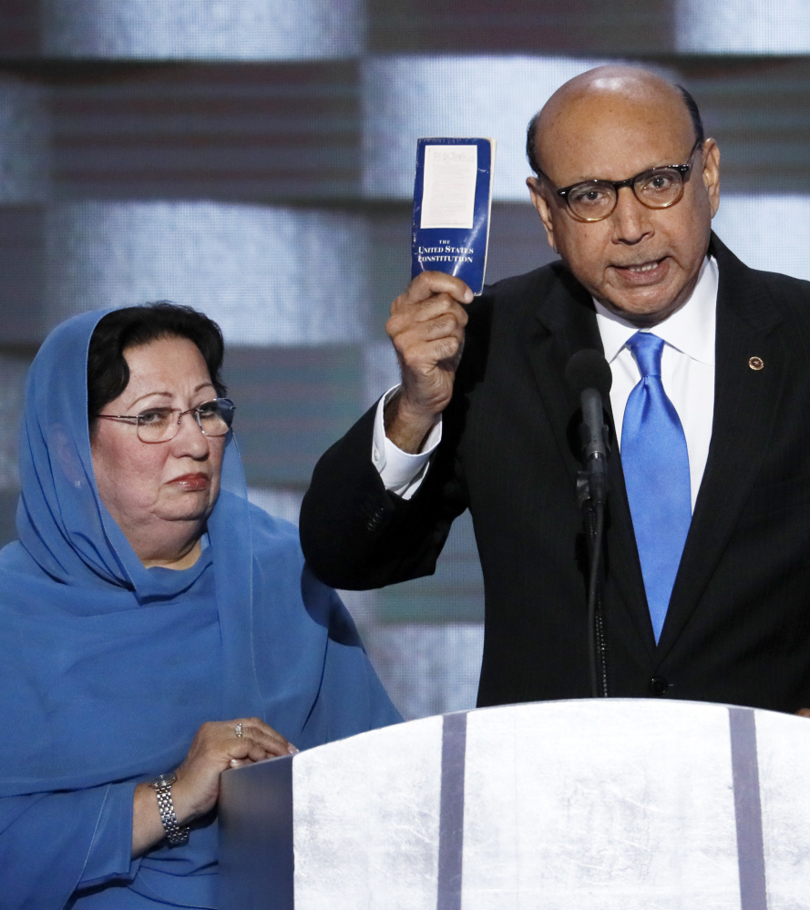 Khizr Khan, father of fallen U.S. Army Capt. Humayun S.M. Khan, holds up a copy of the U.S. Constitution at the Democratic National Convention in Philadelphia on Thursday.
Associated Press/J. Scott Applewhite