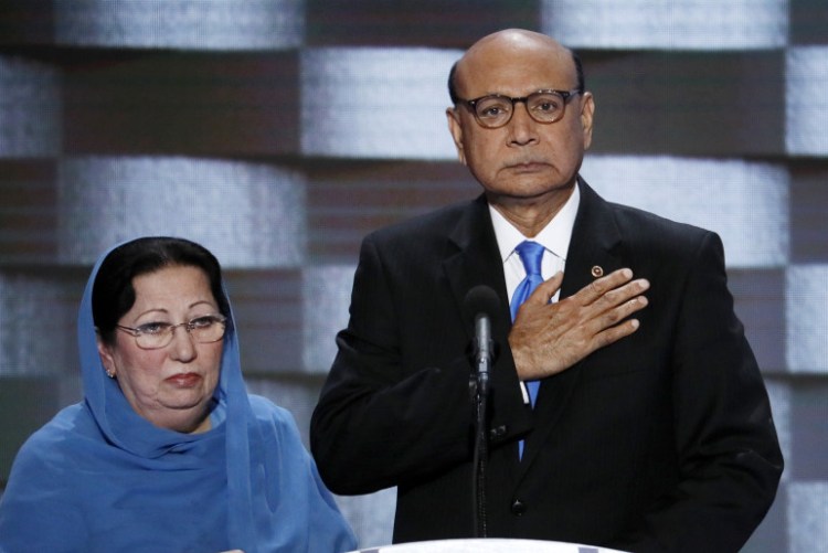 Khizr Khan, father of fallen Army Capt. Humayun S.M. Khan, speaks during the final day of the Democratic National Convention in Philadelphia. Khizr Khan's wife, Ghazala, stands at his side.