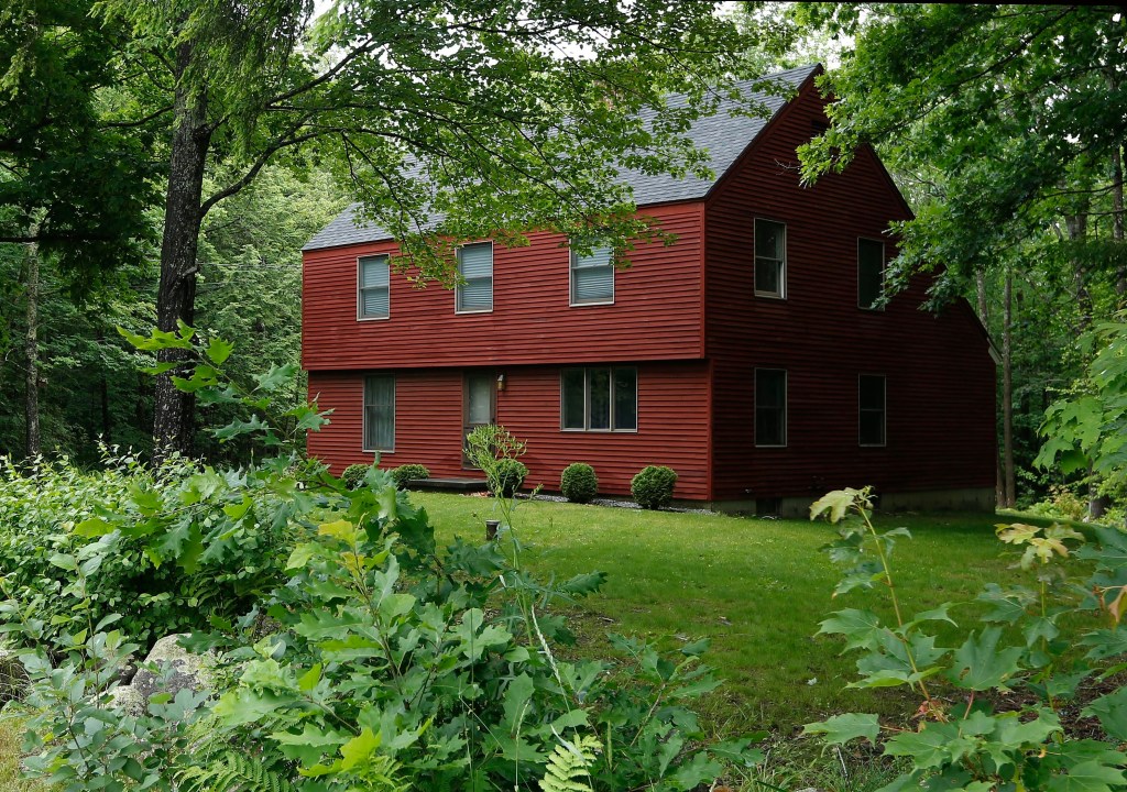 In this Tuesday, June 29, file photo, the home of U.S. Rep. Bruce Poliquin, R-Maine.  Poliquin, who's made fiscal responsibility a hallmark of his campaigns, has been late on paying property taxes for his personal properties and his real estate company numerous times.