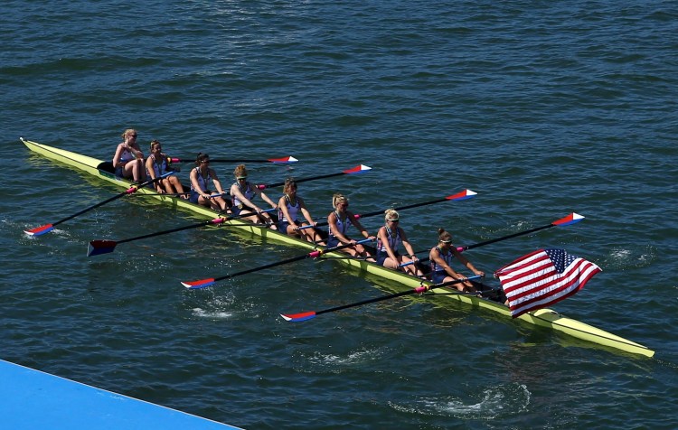 The United States women's rowing team takes a victory lap after winning the gold in the women's eight event during the Summer Olympics in Rio de Janeiro on Saturday.