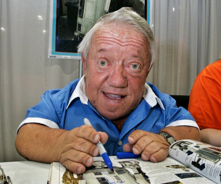 Actor Kenny Baker, who portrayed R2-D2 in the "Star Wars" movies, signs autographs at a convention in Los Angeles in 2007. Associated Press/Reed Saxon