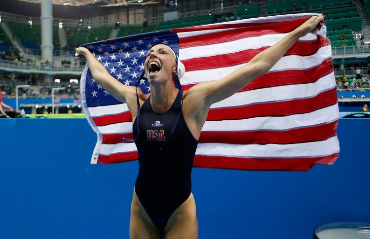 United States' KK Clark of the women's water polo team celebrates after winning the gold medal match against Italy at the 2016 Summer Olympics in Rio de Janeiro, Brazil, on Friday.