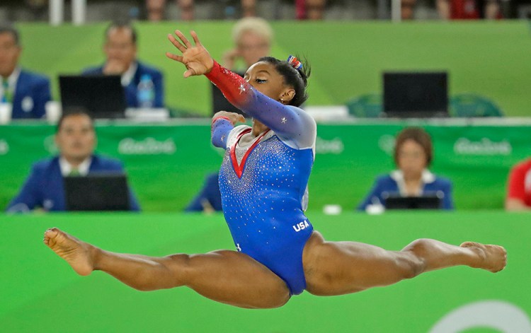 United States' Simone Biles performs on the floor during the artistic gymnastics women's apparatus final at the 2016 Summer Olympics in Rio de Janeiro, Brazil, Tuesday, Aug. 16, 2016. (AP Photo/Dmitri Lovetsky)