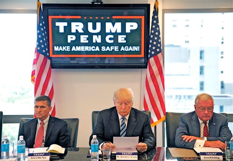 Republican presidential candidate Donald Trump conducts a roundtable discussion on national security in his offices in Trump Tower in New York, Wednesday. Left is Ret. Army Gen. Mike Flynn and right is Ret. Army Lt. Gen. Keith Kellogg. Gerald Herbert/Associated Press