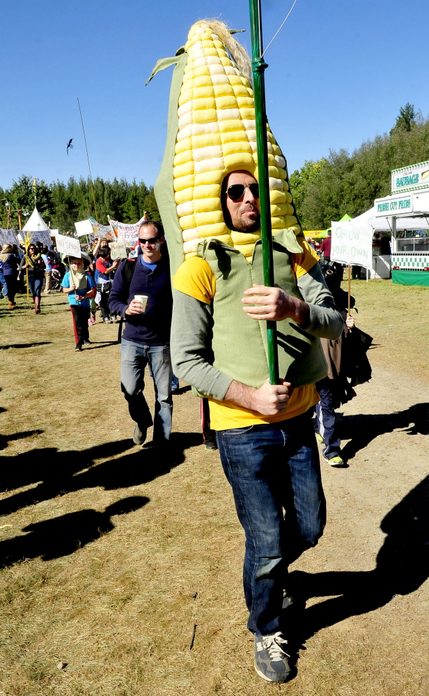 Dave Halstead is dressed as an ear of corn as he marches in the Garden Parade at the 2014 Common Ground Country Fair in Unity. 