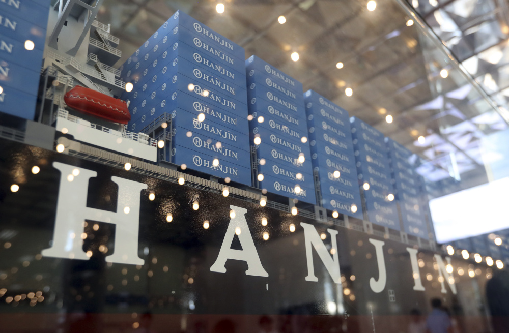 A model of a container ship with Hanjin Shipping Co's logo is displayed at its head office in Seoul, South Korea.
