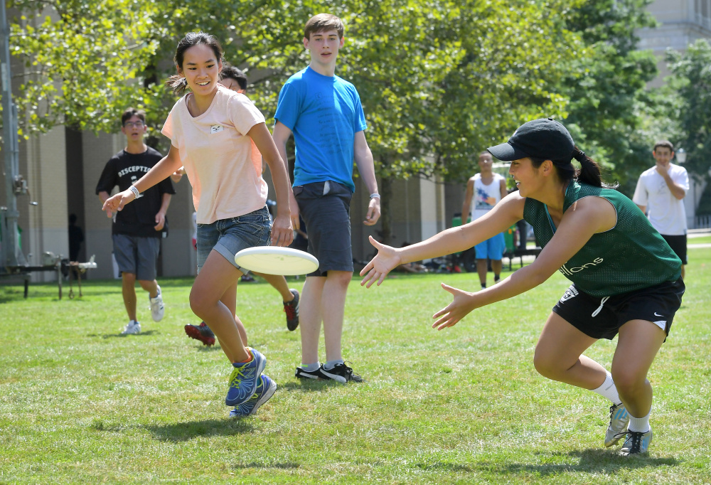 Engineering student Priscilla Chung, above left, and Annette Chen, an informations systems major, play ultimate Frisbee at Carnegie Mellon University. Jelena Kovacevic, left, heads the electrical and computer engineering department at the Pittsburgh school, where 36 percent of the engineering undergraduates are women.