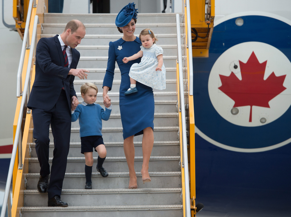 Britain's Prince William and his wife, Kate – the Duke and Duchess of Cambridge – with their children Prince George and Princess Charlotte arrive Saturday in Victoria, British Columbia.