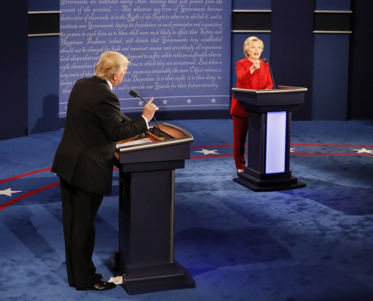 Donald Trump and Hillary Clinton speak at the same time during their first debate of the presidential campaign.