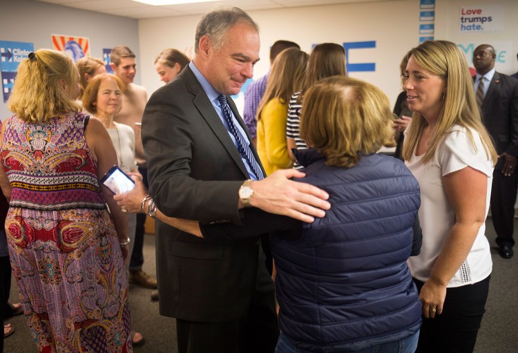 U.S. Sen. Tim Kaine of Virginia, the Democratic vice presidential candidate, talks with volunteers at a Hillary Clinton-Tim Kaine campaign office in downtown Portland on Thursday.