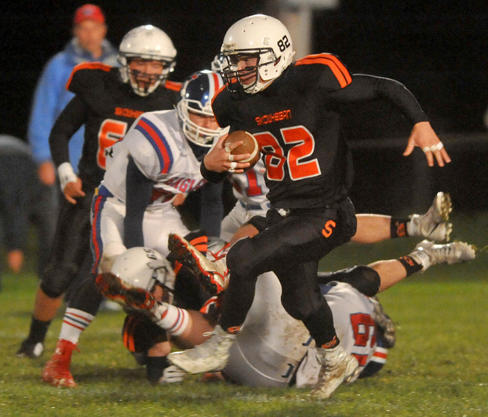 Skowhegan quarterback Garrett McSweeney scrambles for a few extra yards during a Pine Tree Conference Class B game against Messalonskee last season. McSweeney and the Indians play Lawrence tonight.
