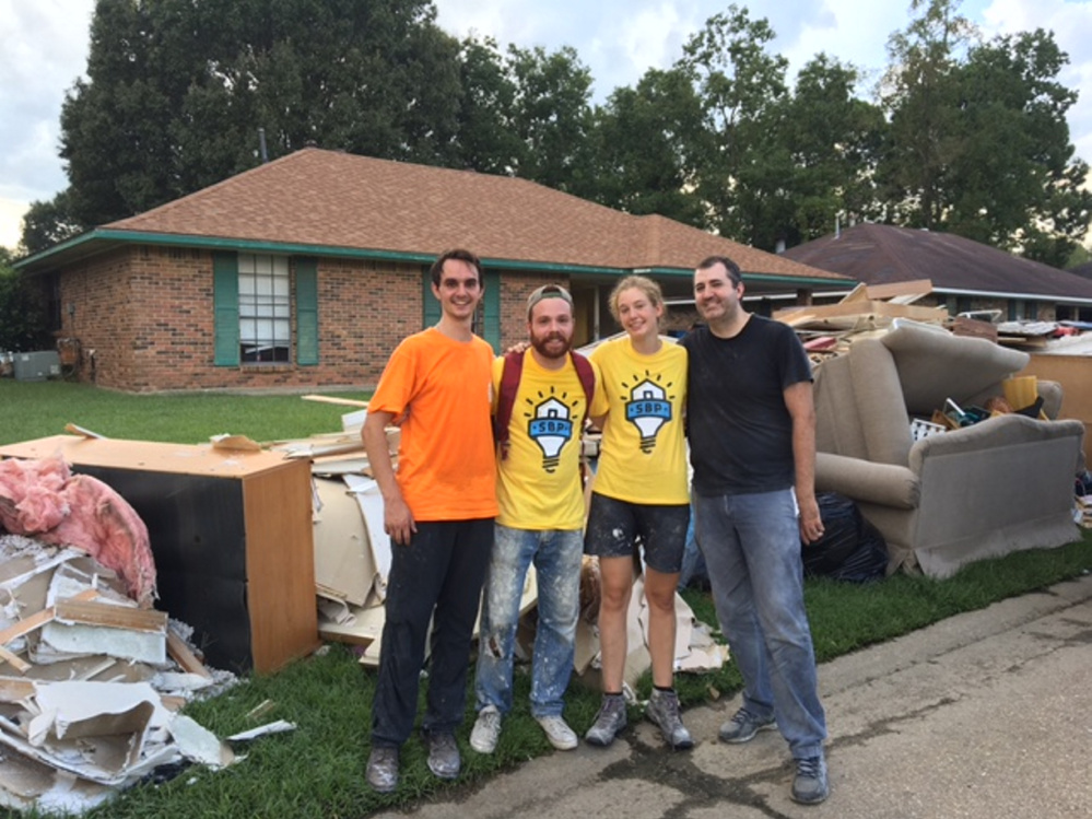 Hall-Dale High School graduate James McCullum, far left, worked recently with other volunteers in Baton Rouge, La., to help the victims of last month's historic flooding that killed 13 and damaged nearly 150,000 homes.