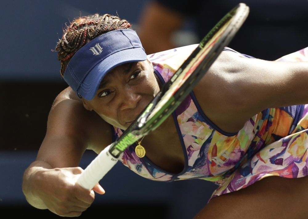 Venus Williams returns a shot to Karolina Pliskova during the fourth round of the U.S. Open on Monday in New York.