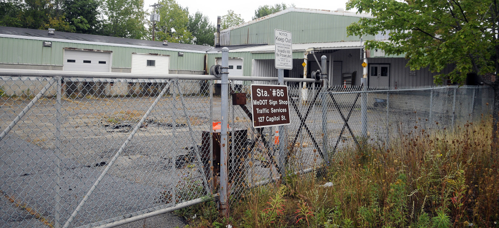 The state issued a request for qualifications seeking bidders to buy the former Maine Department of Transportation maintenance complex on Capitol Street, tear it down and build at least 89,000 square feet of office space for state workers.