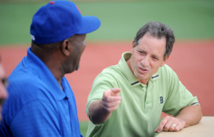 Ken Walsh, executive director of the Alfond Center, introduces former big league relief pitcher Lee Smith, left, during a Fran Purnell Wrigley Field ceremony Wednesday in Waterville.