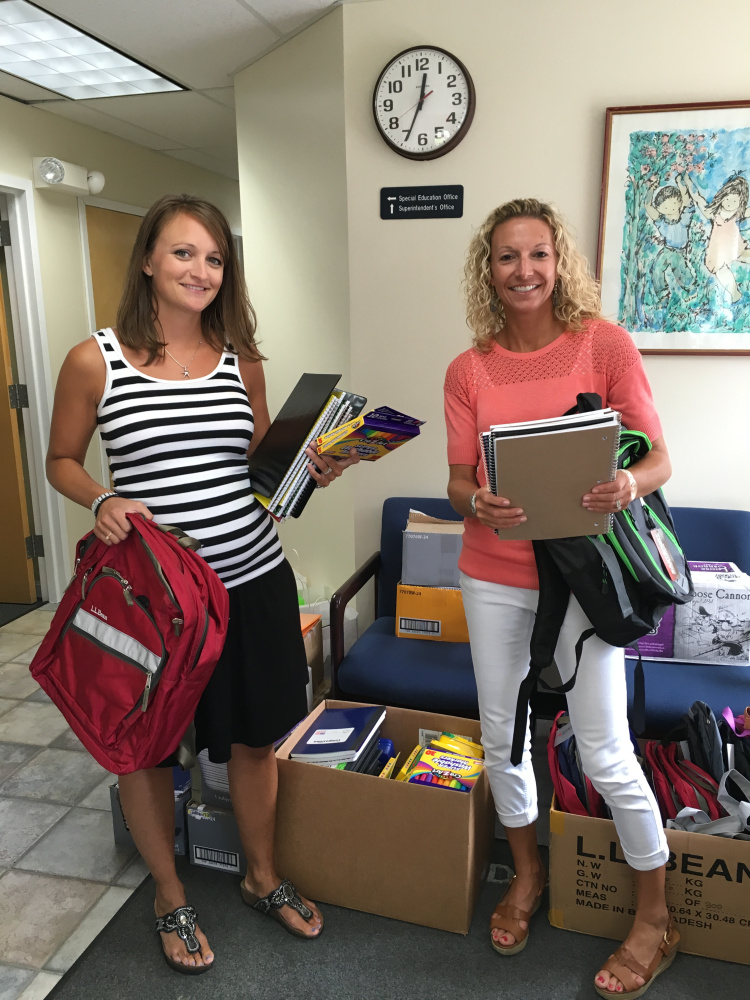 Mallorie Hersom, left, and Angie Dooley, both guidance counselors at MSAD 49, helped with the United Way of Mid-Maine 2016 Summer of Caring "Stuff the Bus" Day of Caring event Aug. 17.