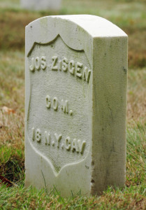 This Aug. 17 photo shows the grave marker for Joseph Zisgen at the Togus National Cemetery. He was part of the Army unit that caught John Wilkes Booth after he assassinated President Abraham Lincoln and is one of the notable people buried at Togus.