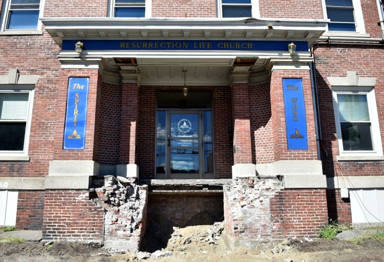 The former Elks building at 13-15 Appleton St. in Waterville, seen Friday, will be demolished soon and replaced by a parking lot as part of downtown revitalization efforts.