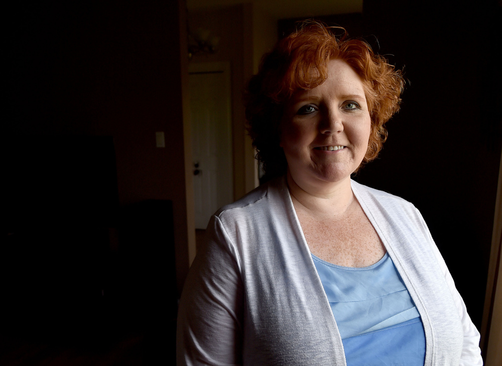 Tami Labul poses for a portrait in her home on Osborne Road in Farmington on Thursday. Labul, a Regional School Unit 9 board member, has started a budget task force to find a productive way to explore differences in future school budgets.