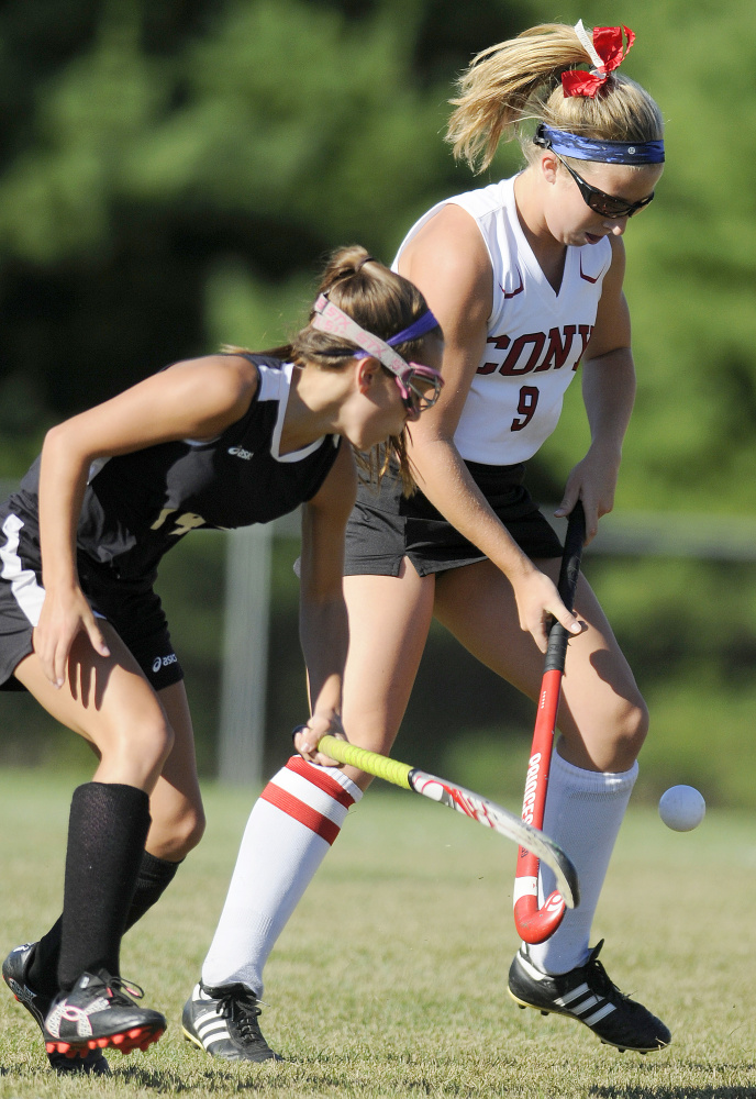 Cony senior Delaney Keithley, right, blocks a pass toSkowhegan freshman Alexis Michonski during a Kennebec Valley Athletic Conference Class A game Tuesday in Augusta.