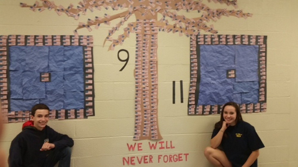 Mid-Maine Technical Centers Emergency Services students, Hunter Guptill and Kylee Morrissee, coordinated this year's 9/11 design that represents the two memorial pools protected by the tree that survived. A total of 25 students helped put together the project.