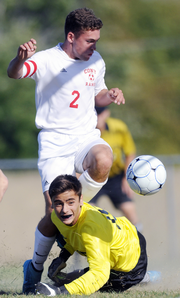 Cony's Jeff Bilodeau (2) drives a goal past Messalonkee's Chase Warren during a game Thursday in Augusta.