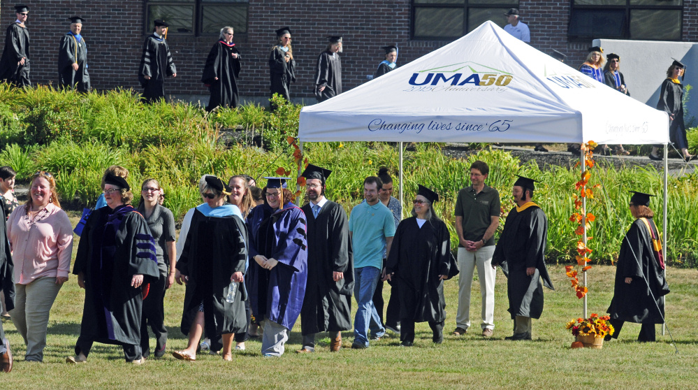 Faculty and rising scholars process in at the start of University of Maine at Augusta's Convocation on Friday on campus in Augusta.