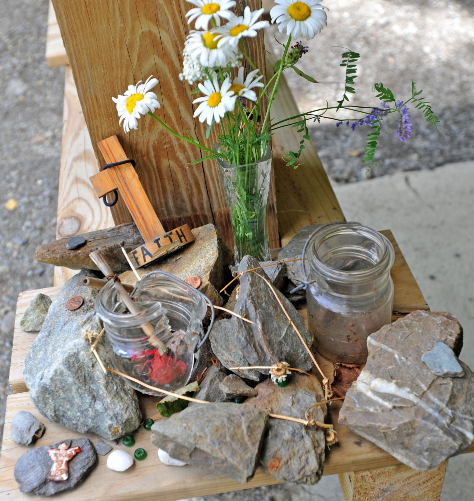 A memorial for missing hiker Geraldine Largay remains at the Appalchian Trail kiosk at the Appalachian Trail crossing on Route 27 in Wyman Township on July 17, 2014. This is where missing hiker Geraldine Largay, 66, was supposed to meet her husband but never showed up. She hasn't been found to date.