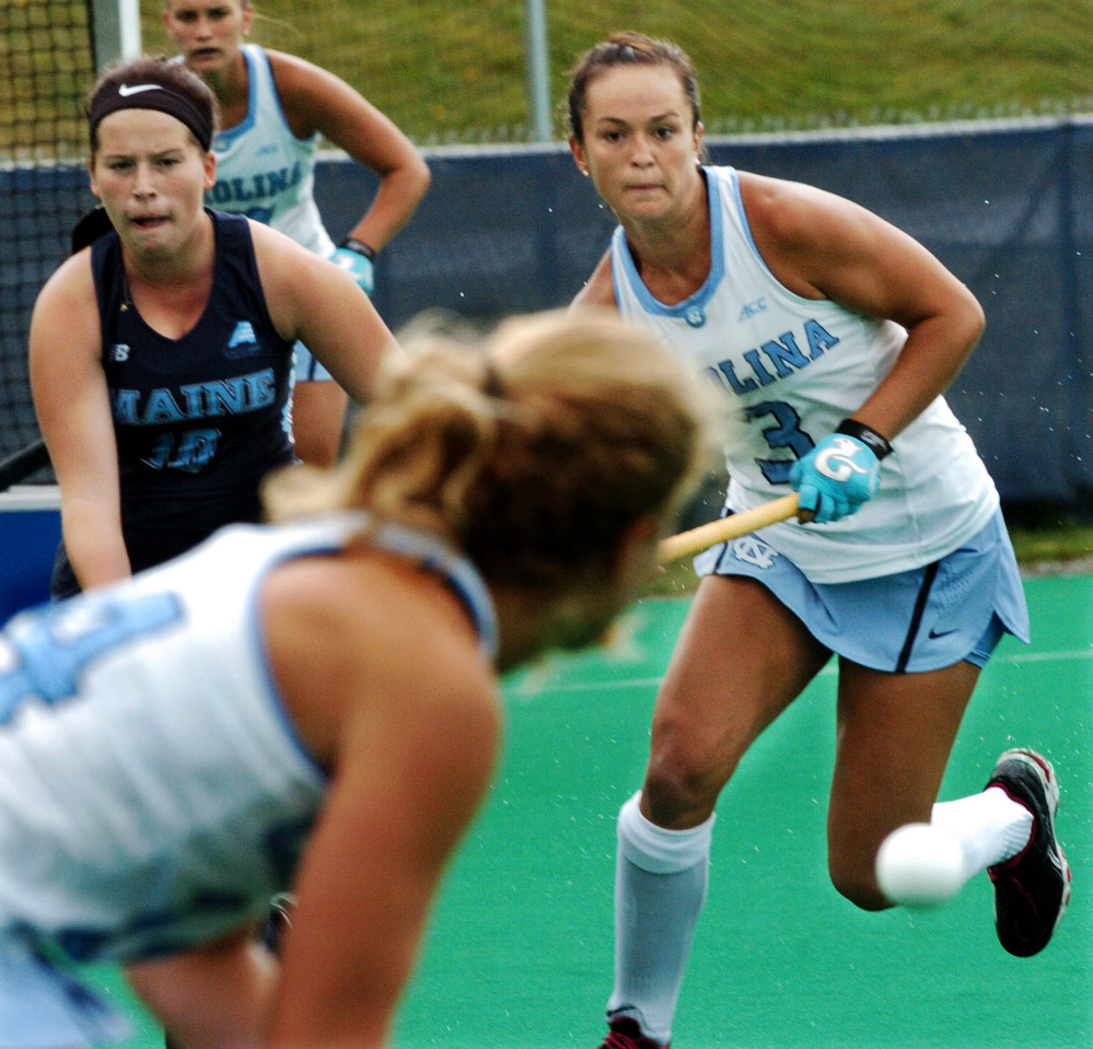 North Carolina's Kristy Bernatchez, right, goes after the ball against the University of Maine on Sunday in Orono.