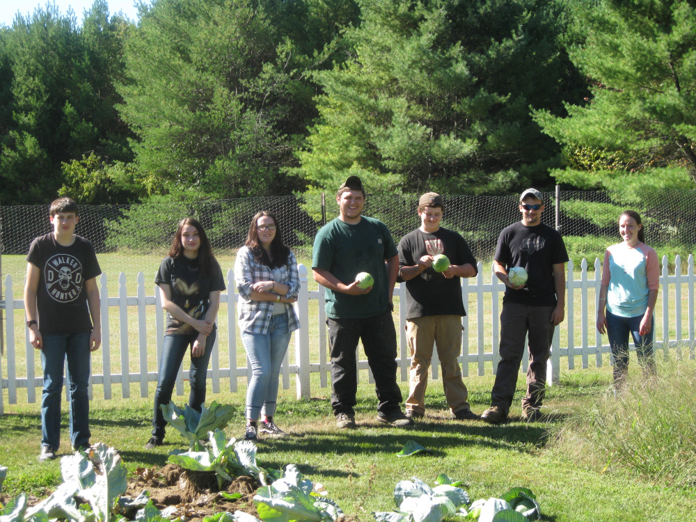 A group of six students and an instructor from the Maine Academy of Natural Sciences in Hinckley volunteered their time to help Cedar Ridge Center in Skowhegan to close up portions of their vegetable garden. From left, are Kolby Hibbard, Gabriel Lindsay, Izabel Wyman, Darrin LeBarge, Brennen Boulette, Peter Rotondi and MeANS Social Studies Teacher Jessica Parker.