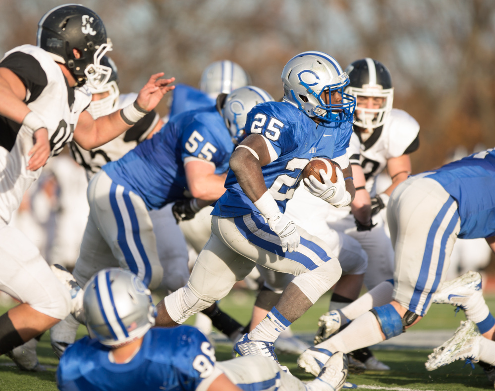 Jabari Hurdle-Price, of Colby College, runs the ball during a NCAA Division III football game in Waterville.