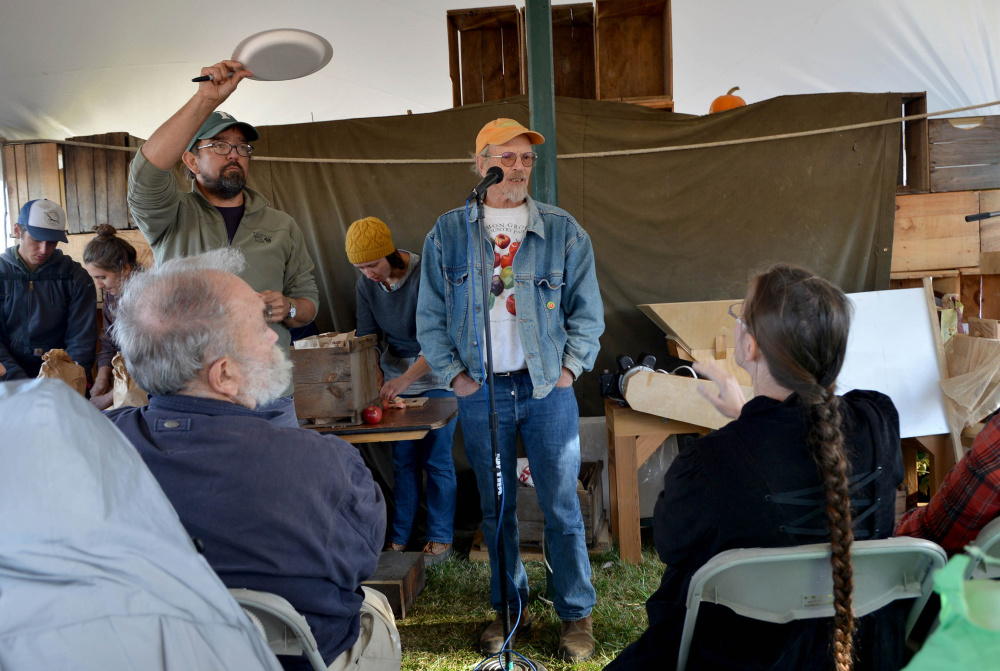 John Bunker speaks during an apple tasting event at the Common Ground Country Fair in Unity on Saturday. Bunker writes the Fedco Tree catalog and is an expert in apple identification.