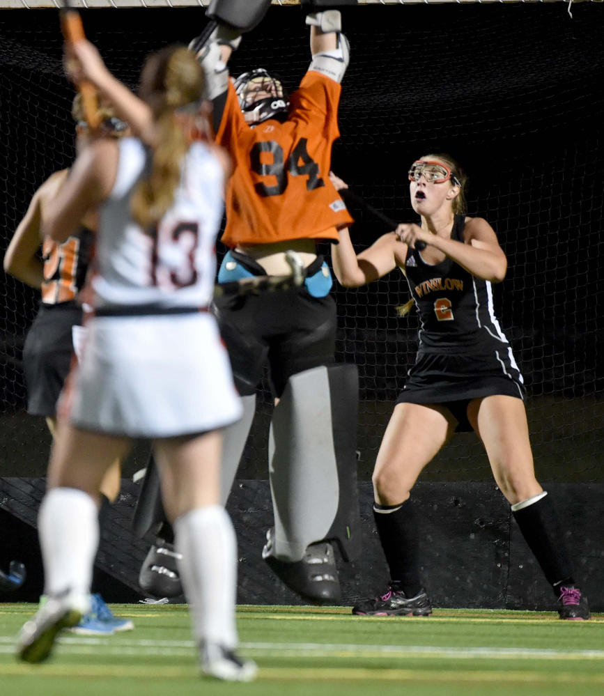 Winslow goalie Hope Winkin (94) leaps to make a save unsuccessfully on a loft shot by Gardiner's Hailey Lovely (13) Tuesday at Thomas College in Waterville.