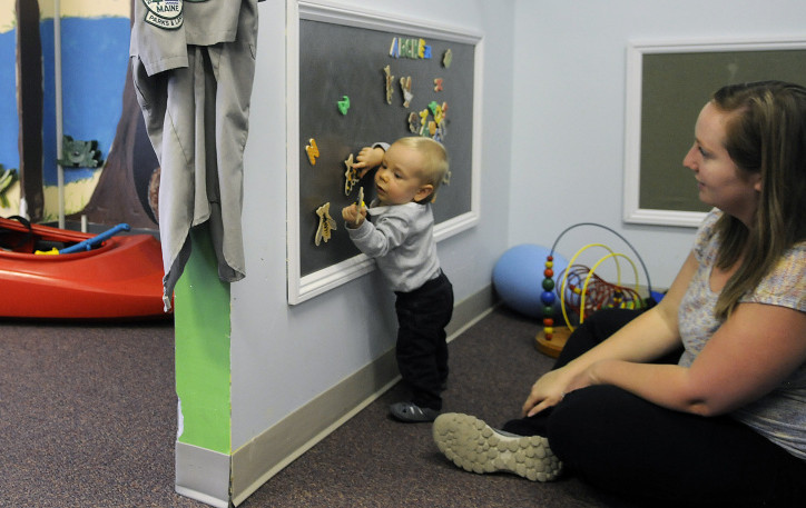 Archer White, 1, plays Thursday with his mother, Jamie, at the Children's Discovery Museum in Augusta. The museum announced it is relocating to Waterville.