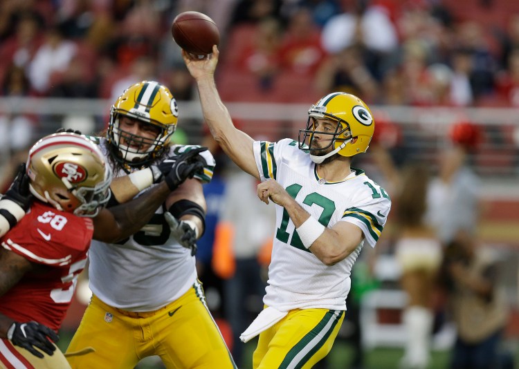 Green Bay quarterback Aaron Rodgers could have a rebound year as his offensive teammates figure to be healthier than last season.    Associated Press/Ben Margot
