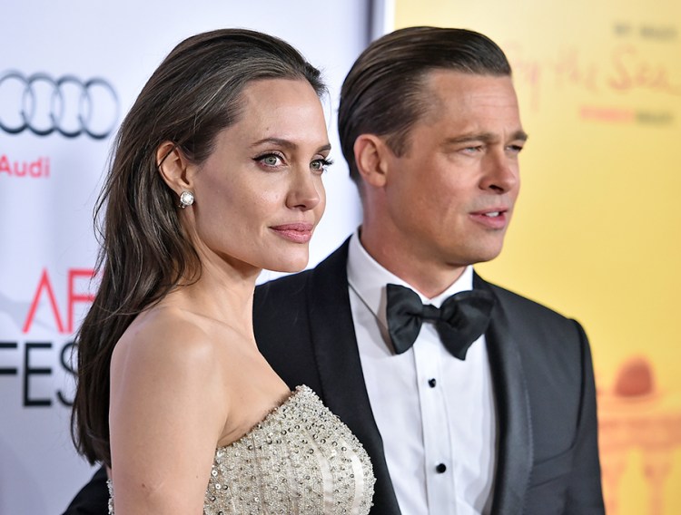 Angelina Jolie and Brad Pitt arrive at the premiere of "By The Sea" on Nov. 5, 2015, in Los Angeles. 