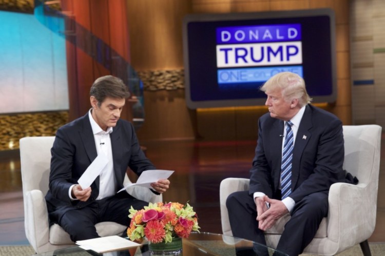 Dr. Oz and Republican presidential candidate Donald Trump talk during a taping of the syndicated "Dr. Oz Show," which will be broadcast Thursday afternoon.