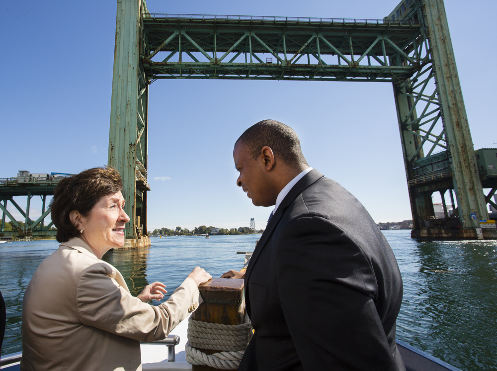 U.S. Sen. Susan Collins talks with Transportation Secretary Anthony Foxx during a boat tour beneath the construction site of the Sarah Mildred Long Bridge. The bridge is being removed and a new bridge is being built across the Piscataqua River between Portsmouth, N.H., and Kittery.