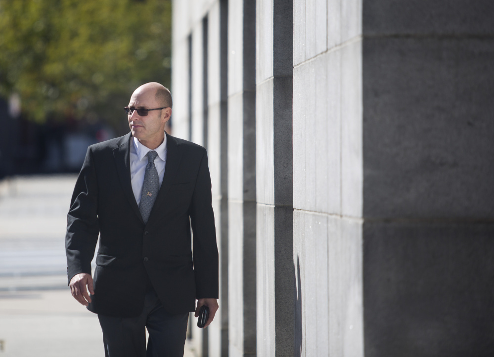 Gregory Nisbet, the Portland landlord on trial for manslaughter, walks back into the courthouse after a short recess on Tuesday Oct. 4, 2016. Nisbet's case is believed to be the first in Maine which a landlord has been accused of causing deaths that were deemed accidental because they did not do enough to ensure the safety of residents.