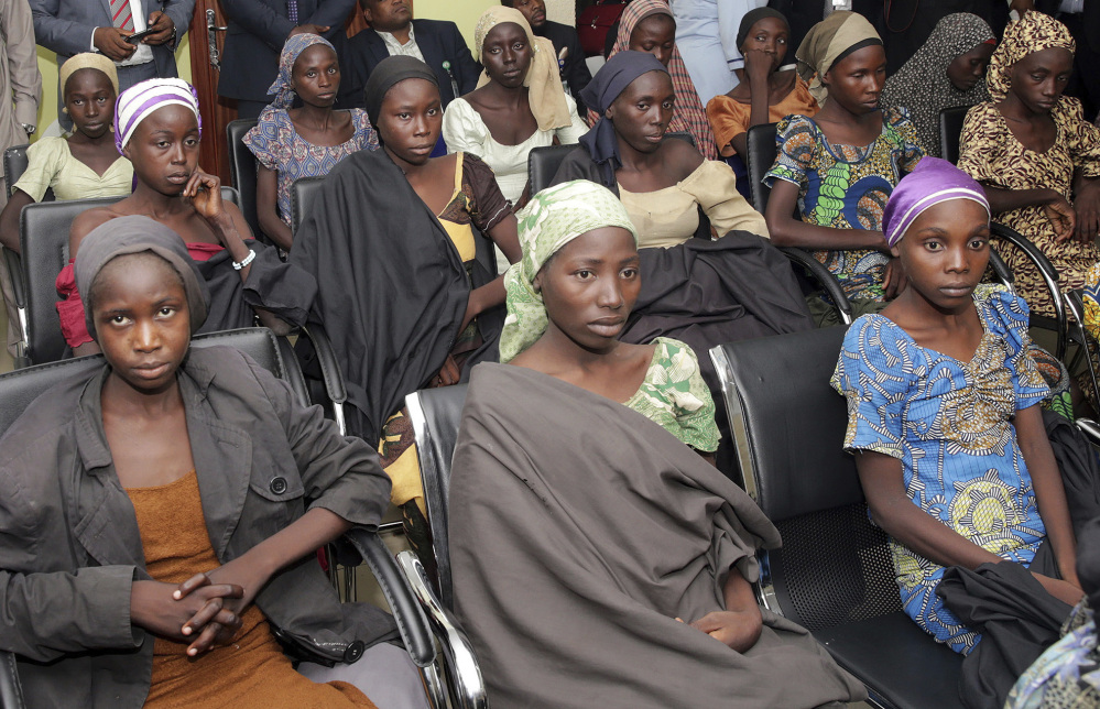 Freed Chibok schoolgirls appeared gaunt and exhausted Thursday in Abuja, Nigeria. Nigeria's presidentail spokesman said the government "all of them are very tired." They were among nearly 300 girls kidnapped and held captive by Boko Haram extremists for more than two years.