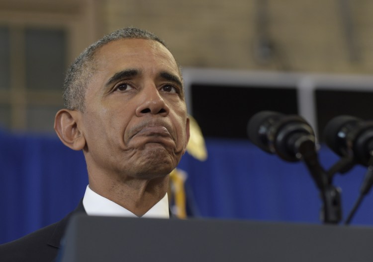 President Barack Obama pauses while speaking at Benjamin Banneker Academic High School in Washington, Monday where he highlighted the steady increase in graduation rates. Despite more than 90 vacancies in the federal judiciary, the Senate has confirmed only nine district and appeals court judges this year as it waits for the end of Obama's second presidential term.