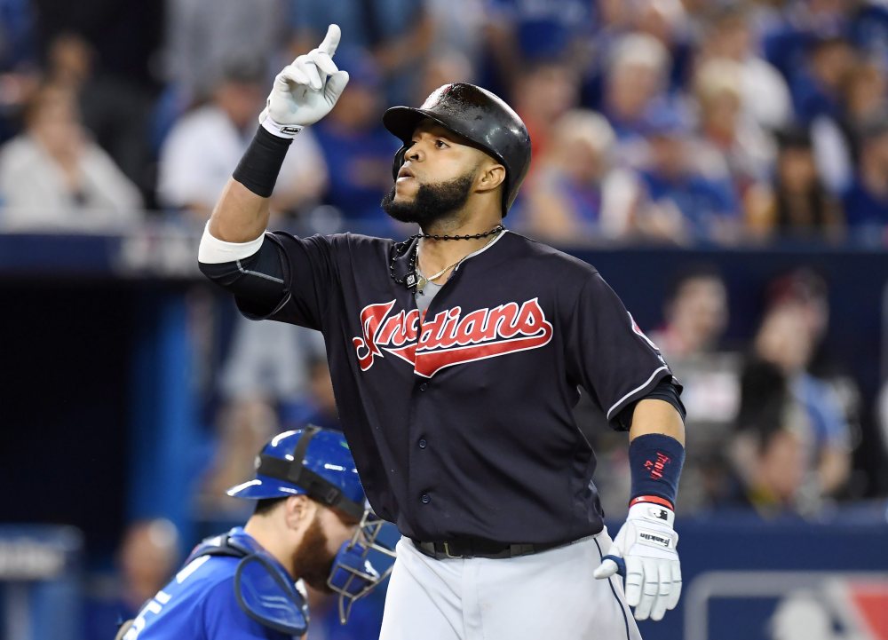Carlos Santana gestures after hitting a home run against the Blue Jays in the third inning in Game 5 of baseball's American League Championship Series in Toronto on Wednesday.