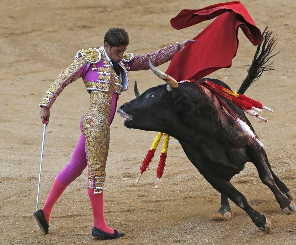 Spanish bullfighter Mario Palacios performs during a bullfight at the Las Ventas bullring in Madrid, Spain, on Oct. 9.