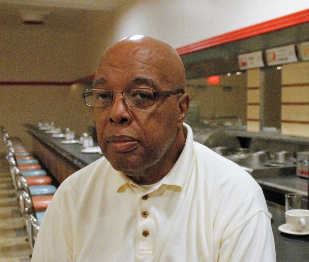 Clarence Henderson last month at the Greensboro, N.C., lunch counter where he protested some 60 years ago.