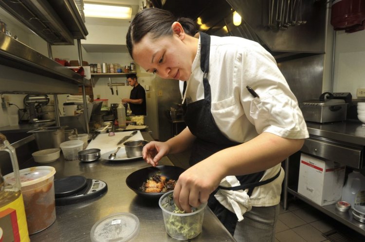 Award-winning  chef Cara Stadler says eliminating tips will allow her two restaurants to offer better pay to cooks and other back-of-house employees.