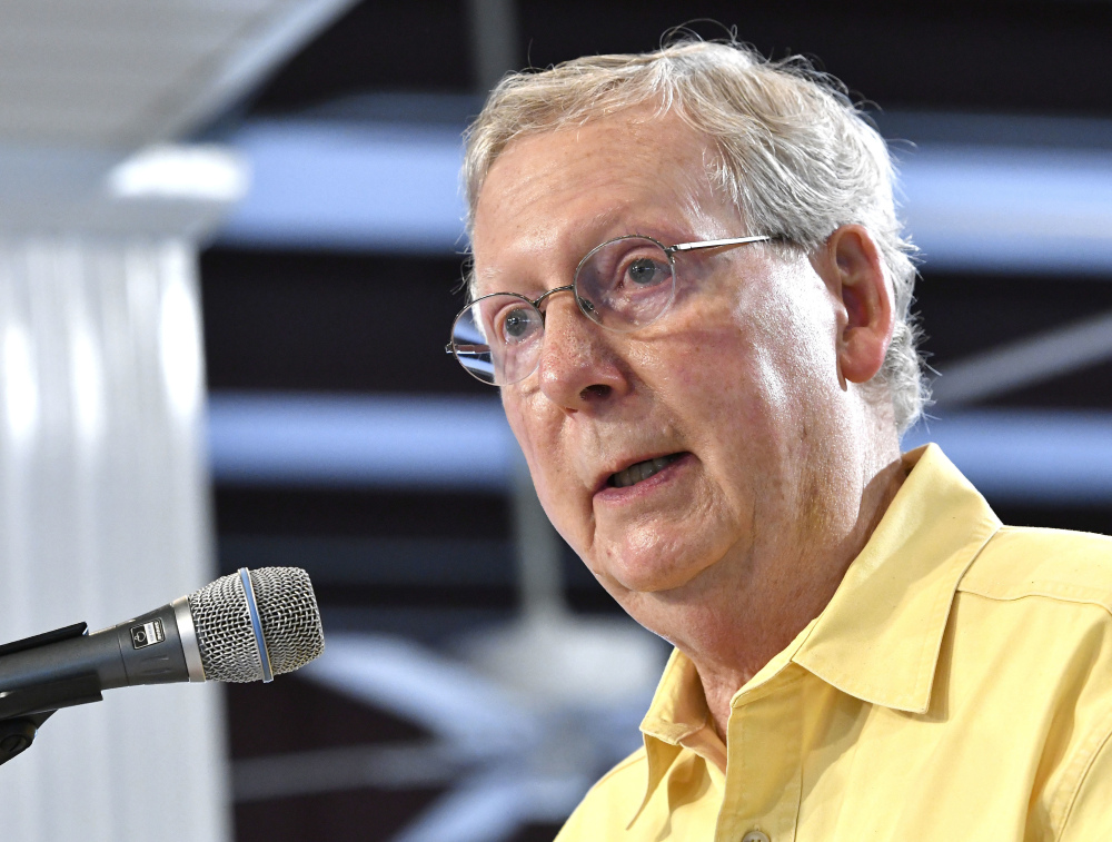 Senate Majority Leader Mitch McConnell addresses a crowd in Fancy Farm, Ky., in August. McConnell has never had much to say about Donald Trump. But lately, he has fallen completely silent.